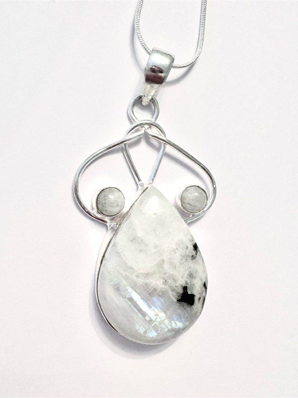 Beautiful, 2 1/2 inch, 925 marked, Rainbow Moonstone pendant on a silver chain.